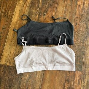 SKIMS black and cream sports bras (2-pack)